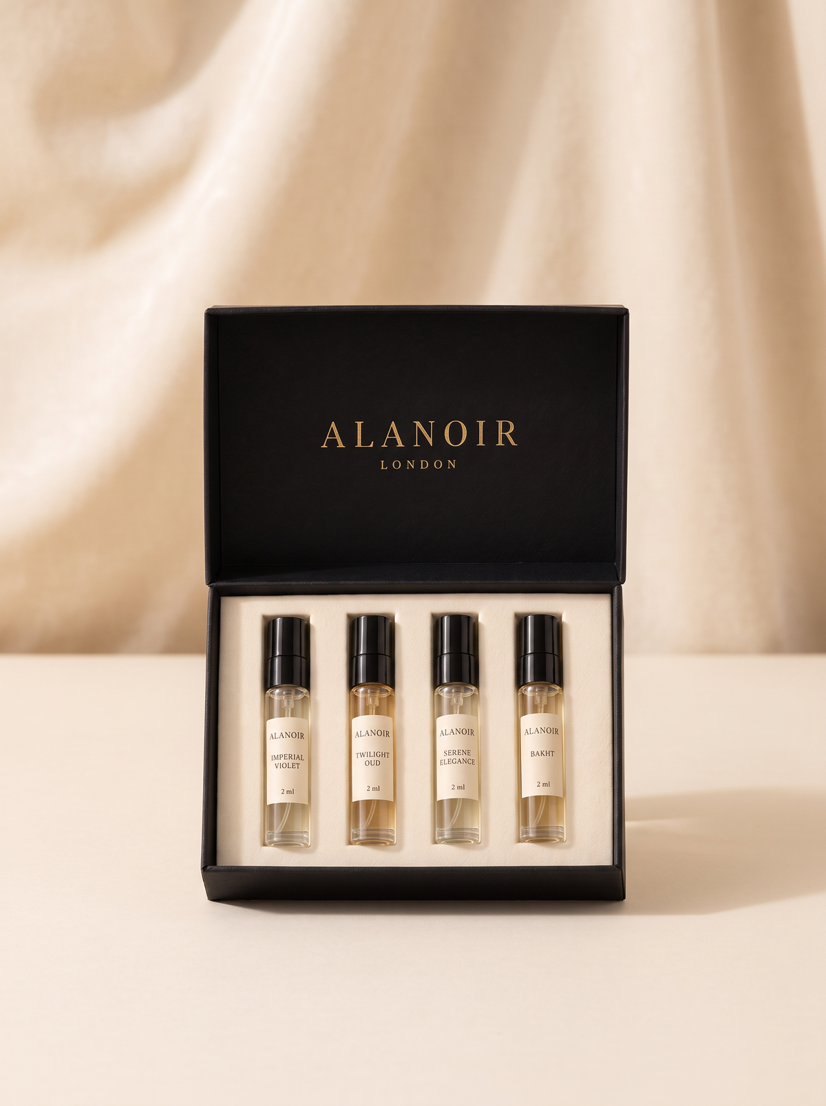 Four Alanoir 2 ml perfume samples in a black presentation box